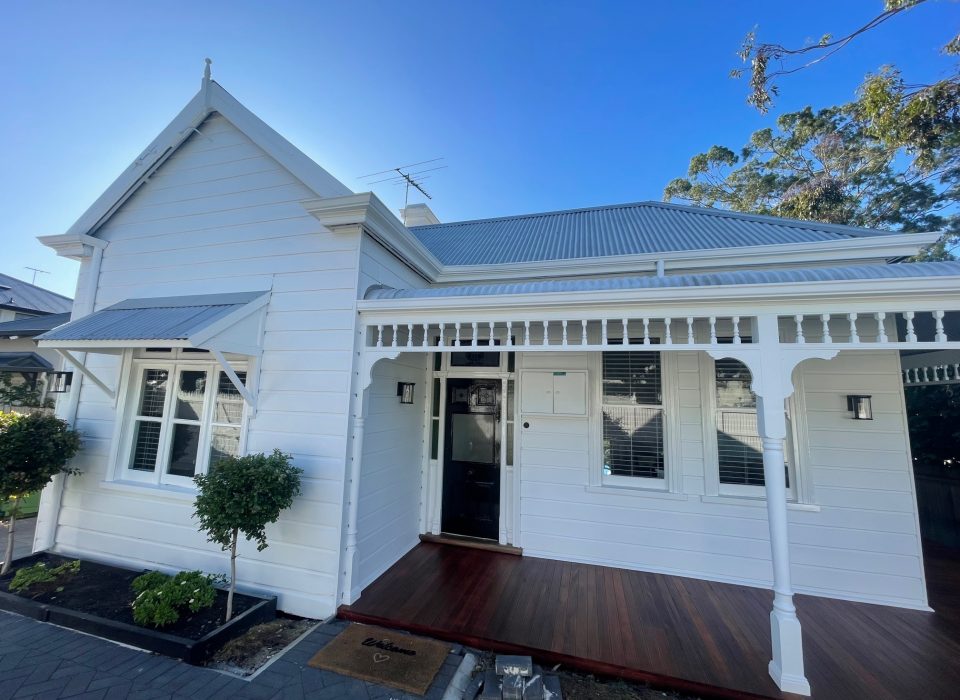A refurbished worker's cottage with a new timber porch